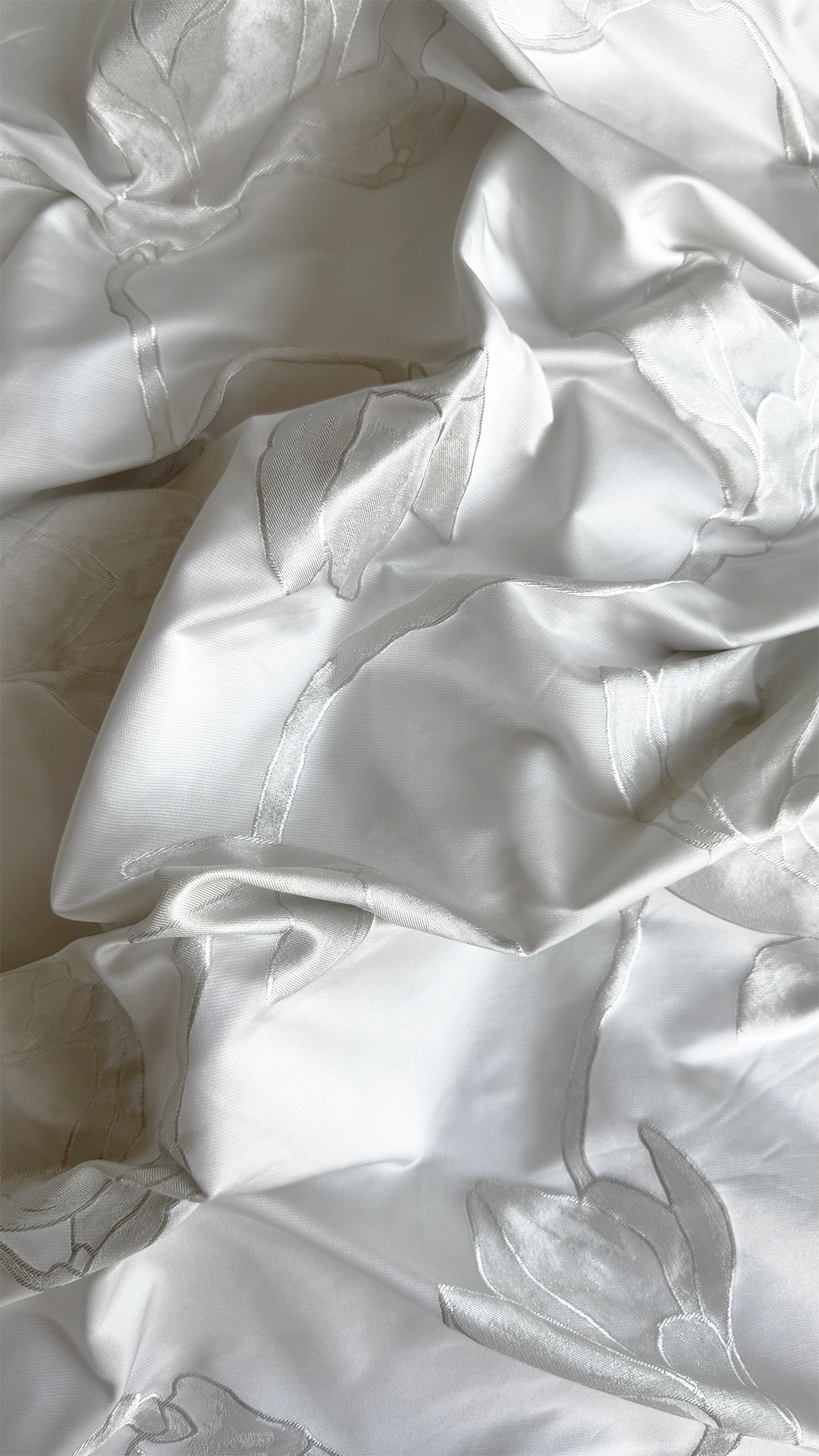 Tissu jacquard avec des fleurs d’ivoire de magnolia