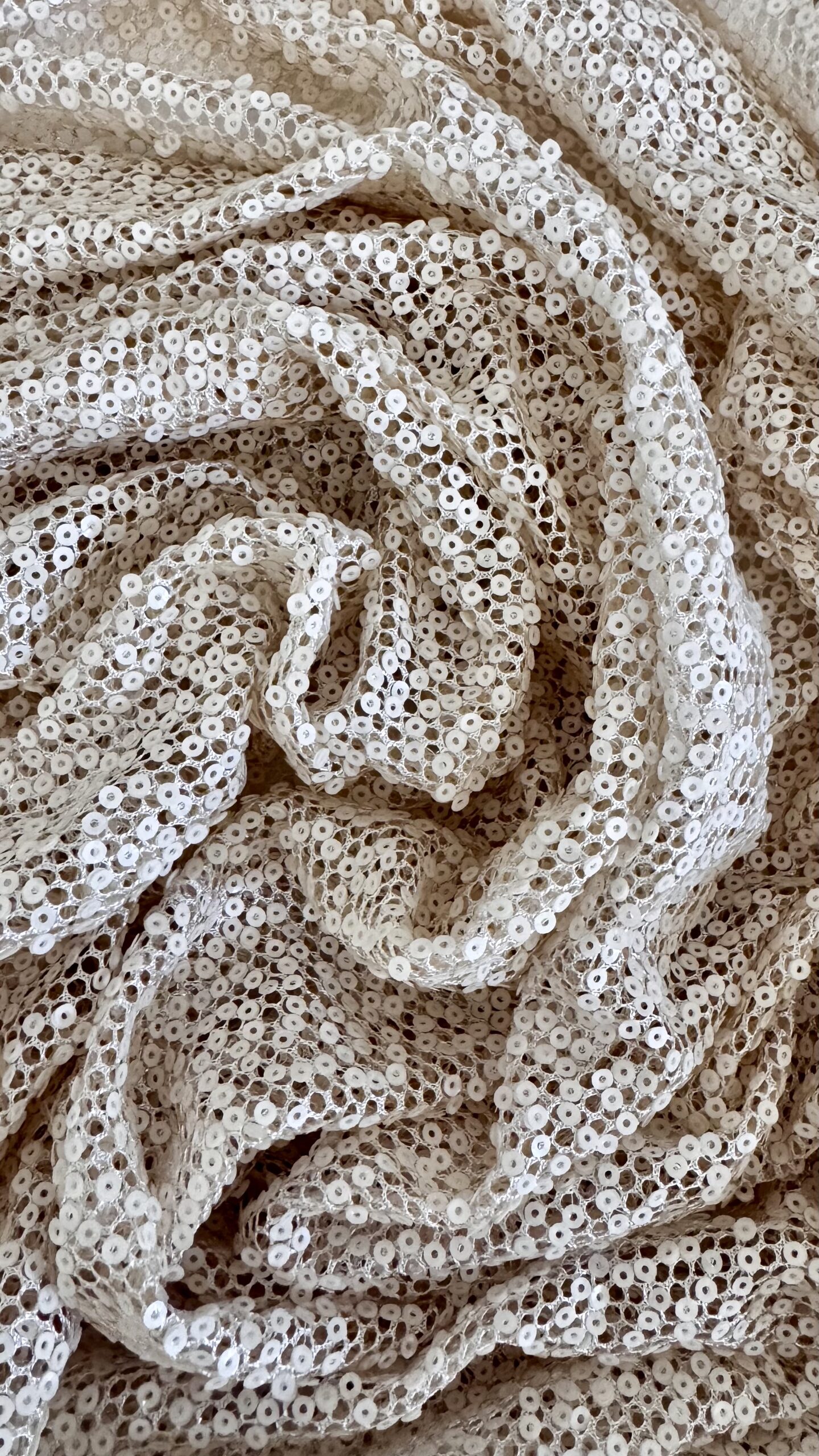 Tessuto paillettes panna in nylon e poliestere